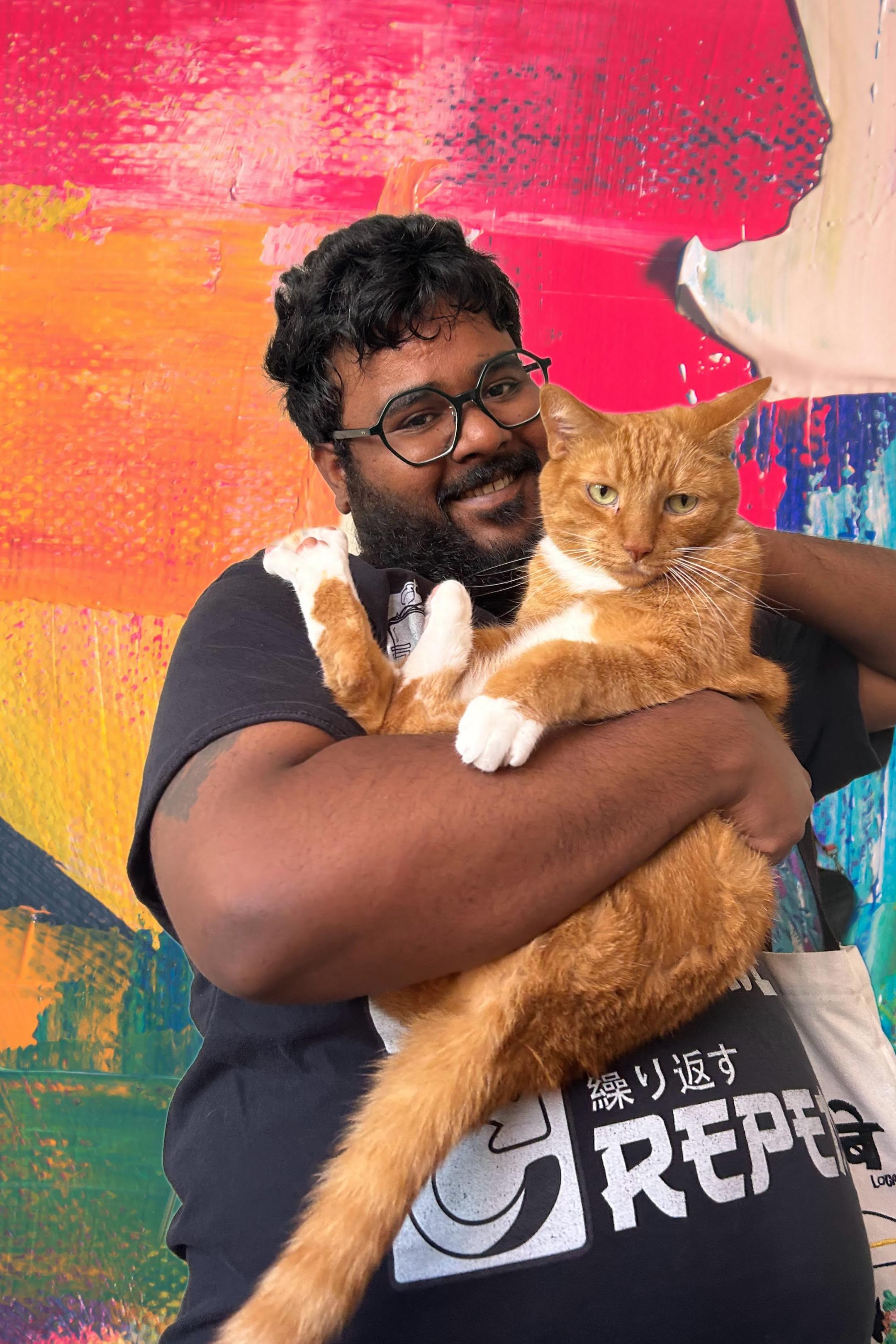 Ahmad holding Oscar